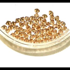 63 Amber colored Crystals